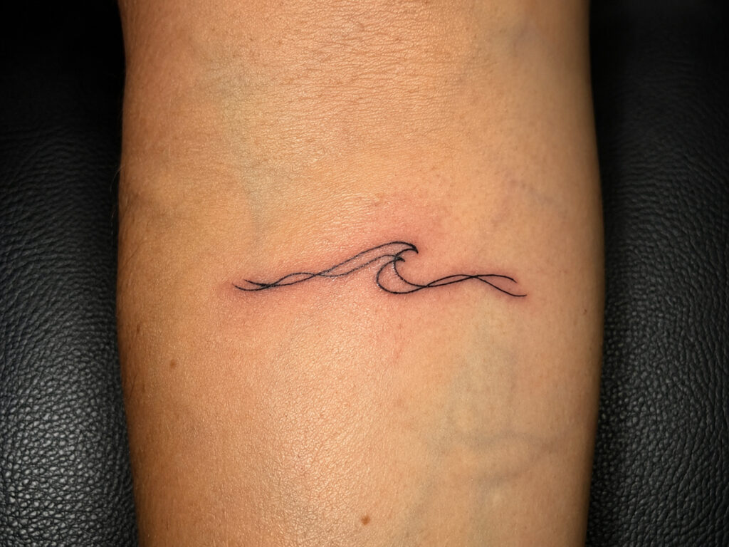 fine line tattoo waves dallas texas